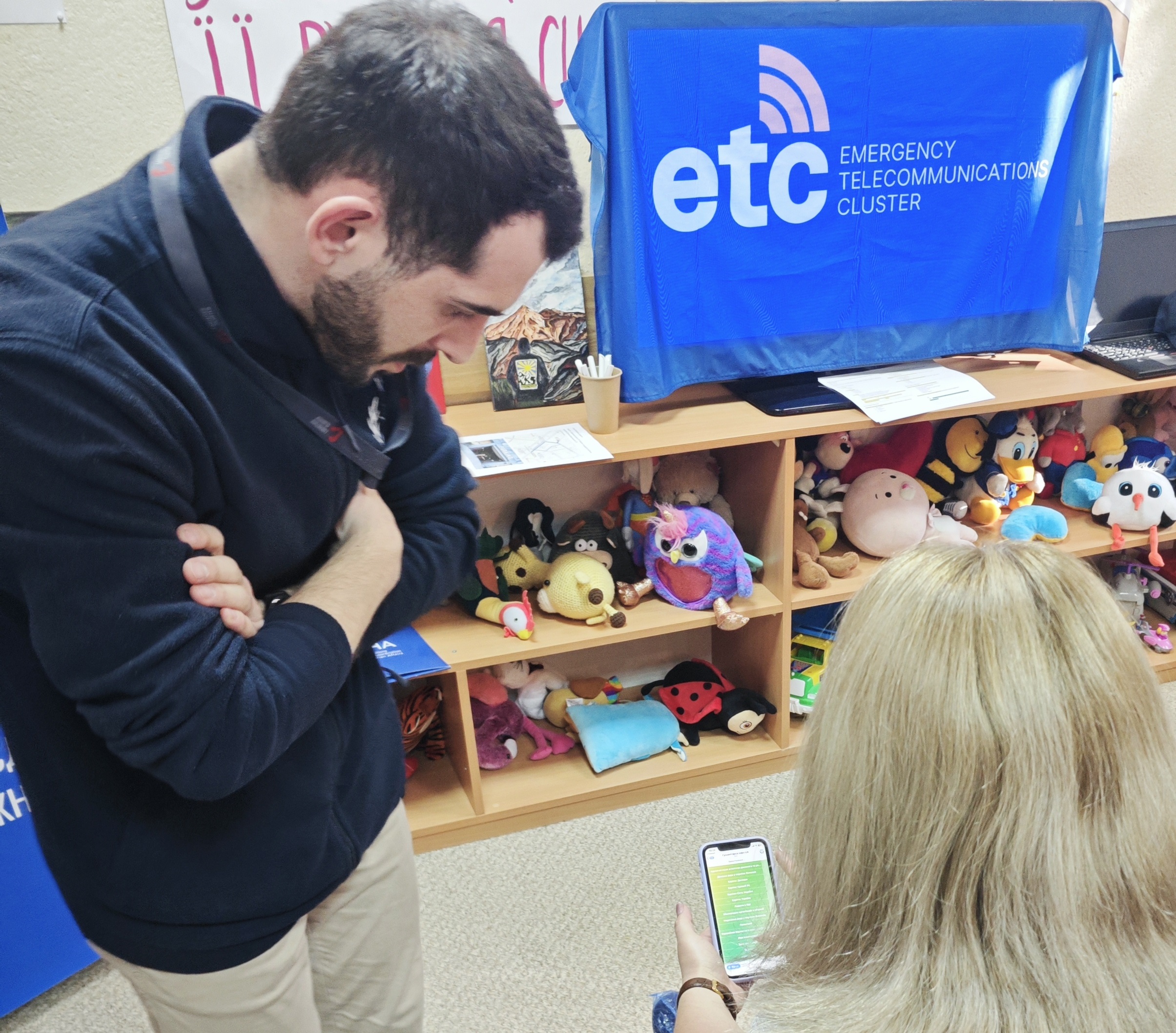 ETC guides users through the Chatbot services. Photo: WFP/Maksym Khmeliuk