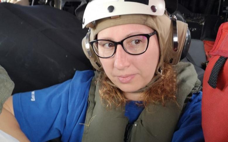Caroline in the helicopter during her mission to The Bahamas.